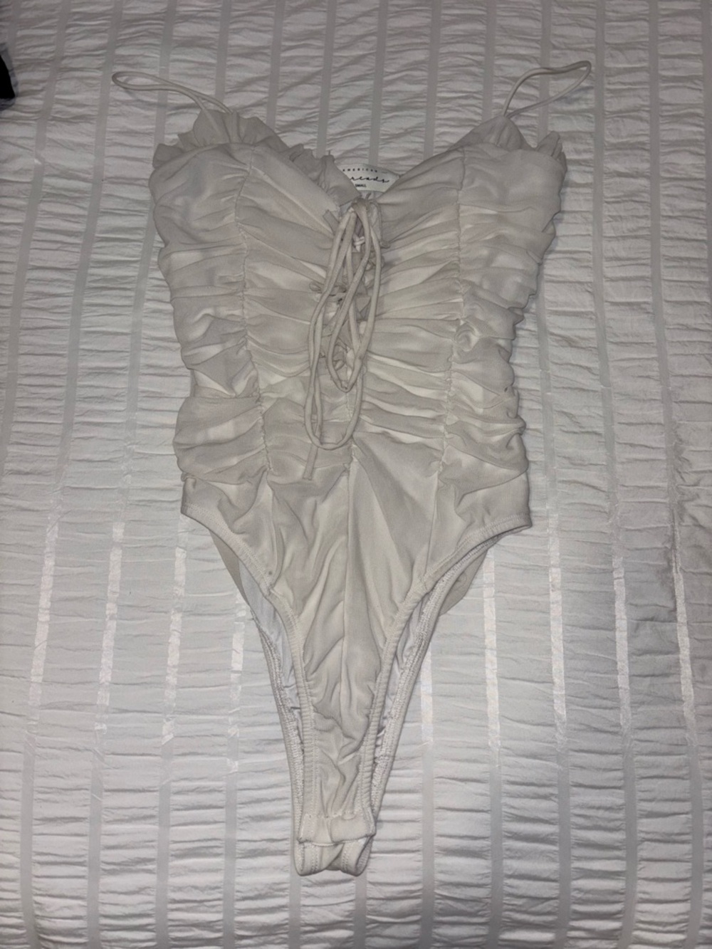 american threads ruffle body suit